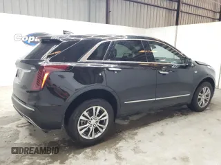 2023 Cadillac XT5 FWD Premium Luxury with VIN 1GYKNCRS6PZ171335, listed as a Copart auction lot 51859385 with 52,691 mi miles and Clean Title. Bid and sale history available at carsss.com. Image 3.