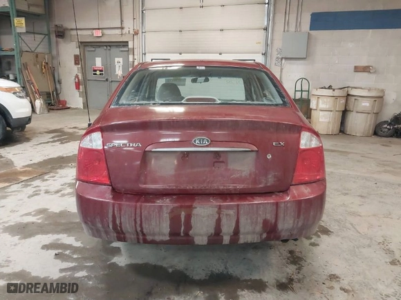 2004 Kia Spectra LX with VIN KNAFE122445012366, listed as a IAAI auction lot 41530178 with 120,115 mi miles. Bid and sale history available at carsss.com. Image 15.