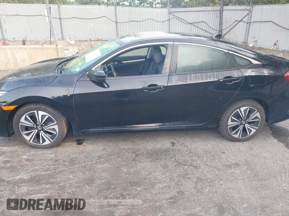 2016 Honda Civic Sedan EX-L with VIN 19XFC1F71GE209163, listed as a IAAI auction lot 40322953 with 149,874 mi miles. Bid and sale history available at carsss.com. Image 14.