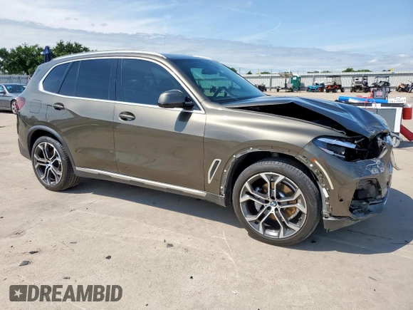 2023 BMW X5 xDrive40i with VIN 5UXCR6C01P9P27041, listed as a Copart auction lot 59009585 with 45,568 mi miles and Salvage title. Bid and sale history available at DreamBid. Image 4.