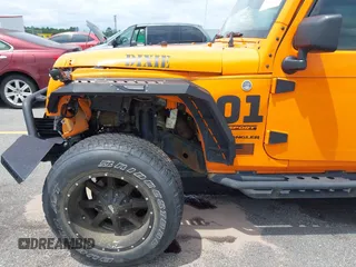 2013 Jeep Wrangler Sport z VIN 1C4AJWAG2DL538526, wystawiony jako IAAI lot #42378501 z przebiegiem 81 709 mil mil oraz . Historia ofert i sprzedaży dostępna na DreamBid. Obrazek 21.