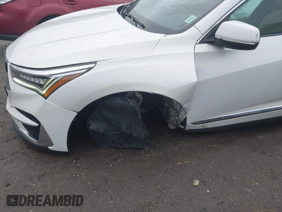 2020 Acura RDX with VIN 5J8TC2H34LL002840, listed as a IAAI auction lot 42509684 with 74,056 mi miles and . Bid and sale history available at DreamBid. Image 6.