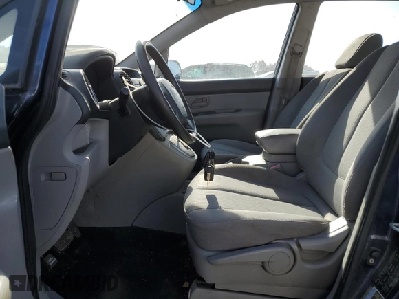 2008 Kia Rondo LX with VIN KNAFG526087154132, listed as a Copart auction lot 77683004 with 117,550 mi miles and Salvage Title. Bid and sale history available at carsss.com. Image 7.