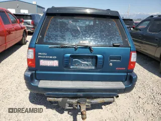 2001 Isuzu Rodeo S z VIN 4S2DM58W014344342, wystawiony jako Copart lot #60161365 z przebiegiem Nie podano mil oraz Czysty tytuł • Clean title. Historia ofert i sprzedaży dostępna na DreamBid. Obrazek 6.