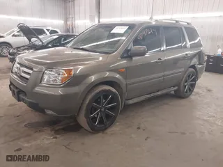 2007 Honda Pilot EX-L with VIN 2HKYF18767H538207, listed as a IAAI auction lot 41747624 with 214,026 mi miles. Bid and sale history available at carsss.com. Image 18.