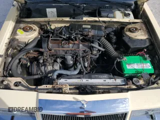 1982 Chrysler LeBaron z VIN 1C3BC45B6CG185348, wystawiony jako Copart lot #47381185 z przebiegiem 69 381 mil mil oraz Tytuł czysty. Historia ofert i sprzedaży dostępna na DreamBid. Obrazek 11.