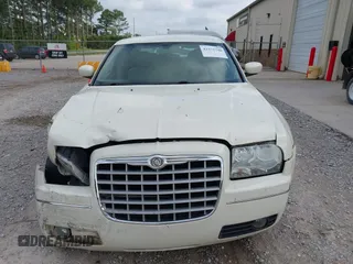 2006 Chrysler 300 Touring z VIN 2C3KA53G56H152229, wystawiony jako IAAI lot #42271740 z przebiegiem 149 740 mil mil oraz . Historia ofert i sprzedaży dostępna na DreamBid. Obrazek 6.