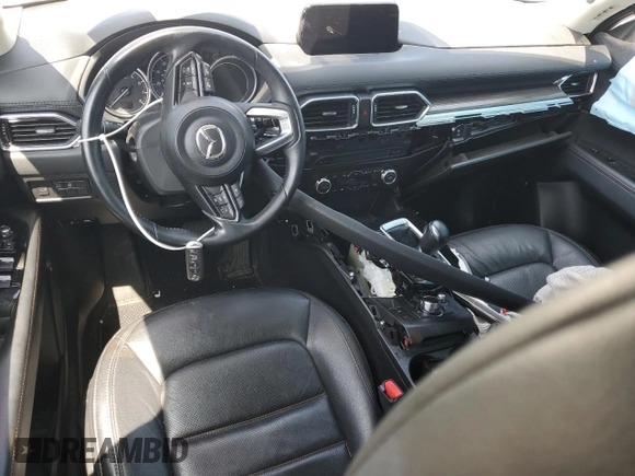 2018 Mazda CX-5 Grand Touring z VIN JM3KFADM3J1464073, wystawiony jako Copart lot #59571385 z przebiegiem Nie podano mil oraz Szkoda całkowita • Salvage title. Historia ofert i sprzedaży dostępna na DreamBid. Obrazek 8.