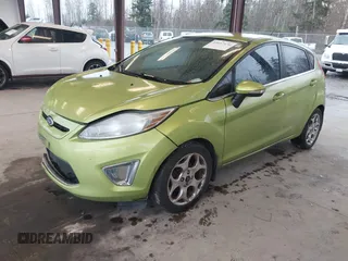 2011 Ford Fiesta SES with VIN 3FADP4FJ7BM127600, listed as a IAAI auction lot 41657170 with 135,483 mi miles. Bid and sale history available at carsss.com. Image 18.