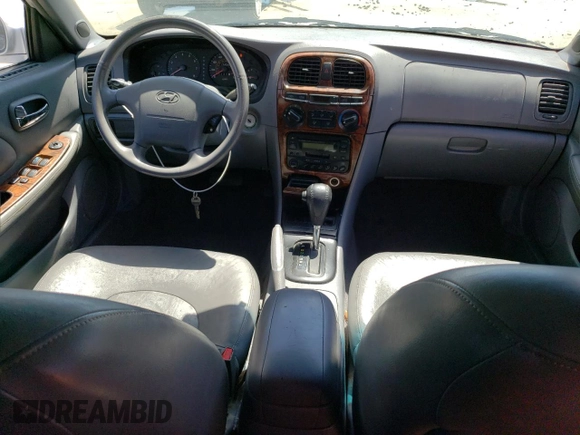 2001 Hyundai Sonata GLS with VIN KMHWF35V81A392523, listed as a Copart auction lot 74584334 with 174,597 mi miles and Salvage Title. Bid and sale history available at carsss.com. Image 8.