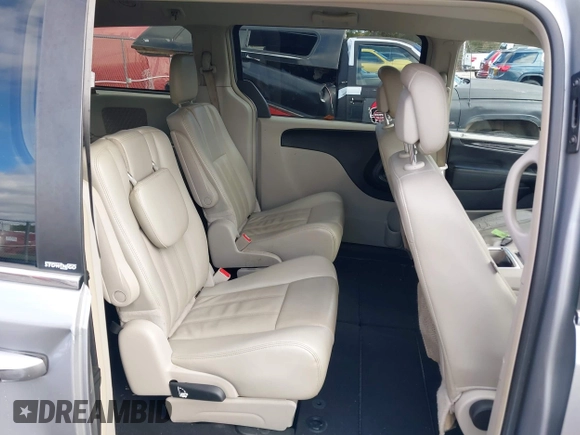 2013 Chrysler Town & Country Touring z VIN 2C4RC1BG8DR775222, wystawiony jako IAAI lot #41080043 z przebiegiem 248 000 mil mil oraz . Historia ofert i sprzedaży dostępna na DreamBid. Obrazek 8.