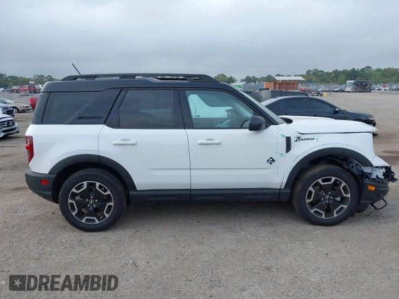 2024 Ford Bronco Sport Outer Banks z VIN 3FMCR9C67RRE17020, wystawiony jako IAAI lot #41866241 z przebiegiem 13 037 mil mil oraz . Historia ofert i sprzedaży dostępna na DreamBid. Obrazek 13.