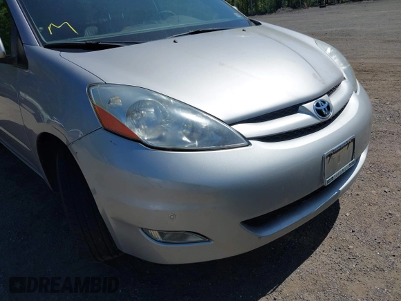 2010 Toyota Sienna XLE with VIN 5TDYK4CC3AS316002, listed as a IAAI auction lot 42138246 with 123,203 mi miles. Bid and sale history available at carsss.com. Image 6.