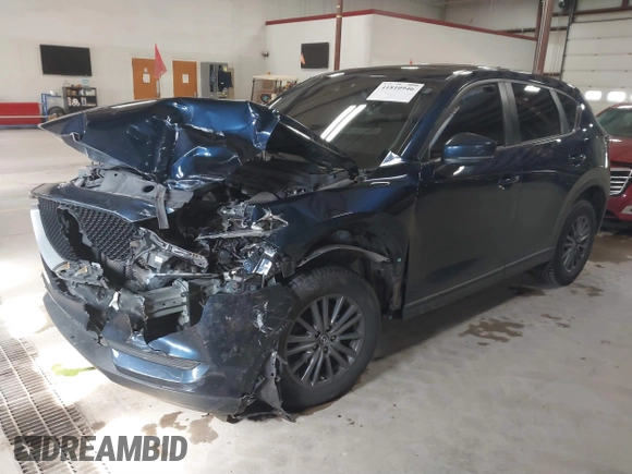 2020 Mazda CX-5 Touring with VIN JM3KFBCM6L0739077, listed as a IAAI auction lot 41810946 with 82,911 mi miles and . Bid and sale history available at carsss.com. Image 2.