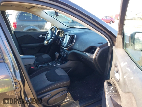 2014 Jeep Cherokee Latitude with VIN 1C4PJMCB5EW294631, listed as a IAAI auction lot 41453628 with 127,847 mi miles and . Bid and sale history available at DreamBid. Image 5.