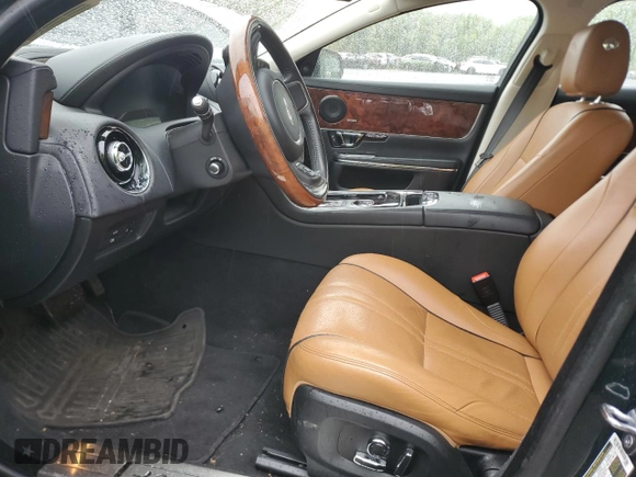 2017 Jaguar XJ R-Sport with VIN SAJWJ1CD0H8W12659, listed as a Copart auction lot 56292635 with 18,765 mi miles and Salvage Title. Bid and sale history available at DreamBid. Image 7.