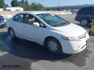 2008 Honda Civic Hybrid with VIN JHMFA362X8S005318, listed as a IAAI auction lot 42009277 with 342,927 mi miles. Bid and sale history available at carsss.com. Image 1.