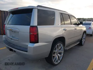 2015 Chevrolet Tahoe LT with VIN 1GNSCBKC2FR232095, listed as a IAAI auction lot 42718627 with 174,130 mi miles and . Bid and sale history available at DreamBid. Image 4.