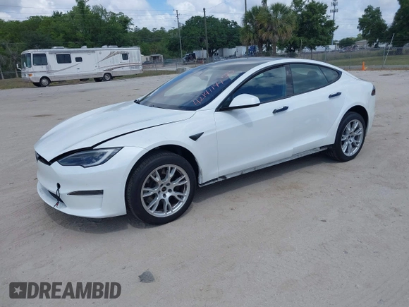 2022 Tesla Model S Plaid with VIN 5YJSA1E6XNF473888, listed as a IAAI auction lot 42141141 with 28,584 mi miles and . Bid and sale history available at carsss.com. Image 19.