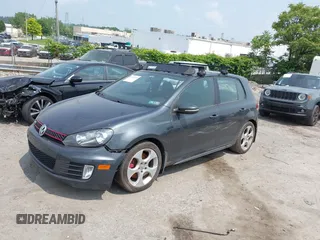2010 Volkswagen GTI with VIN WVWGD7AJ7AW426558, listed as a IAAI auction lot 42443392 with 163,849 mi miles and . Bid and sale history available at DreamBid. Image 2.