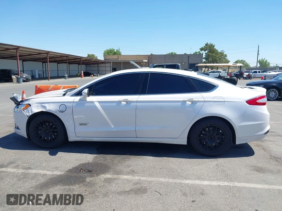 2016 Ford Fusion Titanium z VIN 3FA6P0SU2GR357508, wystawiony jako IAAI lot #42551834 z przebiegiem 177 425 mil mil oraz . Historia ofert i sprzedaży dostępna na DreamBid. Obrazek 14.