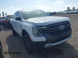 2024 Ford Ranger XLT with VIN 1FTER4GH1RLE26029, listed as a IAAI auction lot 41958379 with 9,716 mi miles and . Bid and sale history available at DreamBid. Image 1.