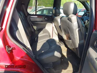 2004 GMC Envoy SLT with VIN 1GKDT13S342150579, listed as a IAAI auction lot 42055124 with 233,090 mi miles and . Bid and sale history available at DreamBid. Image 8.