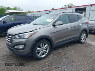 2014 Hyundai Santa Fe z VIN 5XYZW3LA2EG217854, wystawiony jako IAAI lot #42318822 z przebiegiem 120 234 mil mil oraz . Historia ofert i sprzedaży dostępna na DreamBid. Obrazek 2.