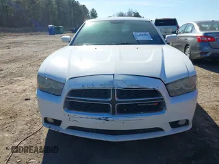 2014 Dodge Charger SXT with VIN 2C3CDXHG8EH117439, listed as a IAAI auction lot 41458304 with 189,041 mi miles and . Bid and sale history available at DreamBid. Image 13.