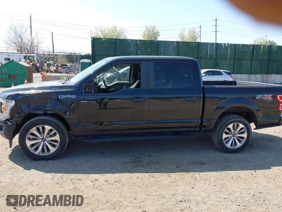 2018 Ford F-150 XL with VIN 1FTEW1EP2JFE13018, listed as a IAAI auction lot 42040276 with 97,563 mi miles. Bid and sale history available at carsss.com. Image 14.