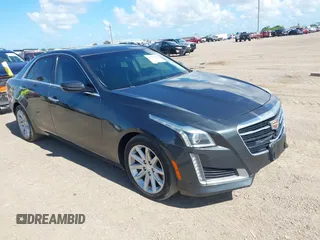 2015 Cadillac CTS Luxury RWD with VIN 1G6AR5SXXF0117520, listed as a IAAI auction lot 42597659 with 148,298 mi miles and . Bid and sale history available at DreamBid. Image 1.
