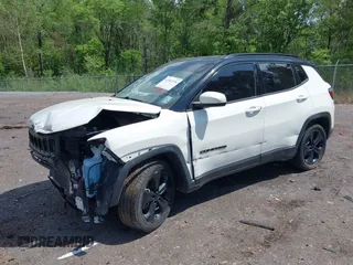 2021 Jeep Compass Altitude with VIN 3C4NJCBB8MT531586, listed as a IAAI auction lot 41941336 with 61,476 mi miles. Bid and sale history available at carsss.com. Image 17.