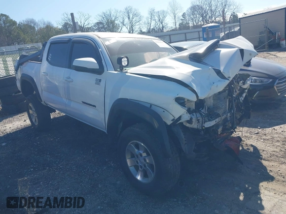 2018 Toyota Tacoma SR with VIN 5TFCZ5AN6JX144056, listed as a IAAI auction lot 41623760 with Not Provided miles and . Bid and sale history available at DreamBid. Image 1.