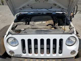 2016 Jeep Wrangler Unlimited Sport with VIN 1C4BJWDG0GL309976, listed as a Copart auction lot 63340505 with 66,714 mi miles and Salvage title. Bid and sale history available at DreamBid. Image 12.