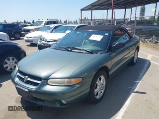 1997 Chrysler Sebring JXi with VIN 3C3EL55H9VT593610, listed as a IAAI auction lot 42130218 with 171,578 mi miles and . Bid and sale history available at DreamBid. Image 2.