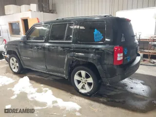 2014 Jeep Patriot Latitude with VIN 1C4NJRFBXED510937, listed as a IAAI auction lot 41577060 with 146,403 mi miles. Bid and sale history available at carsss.com. Image 3.