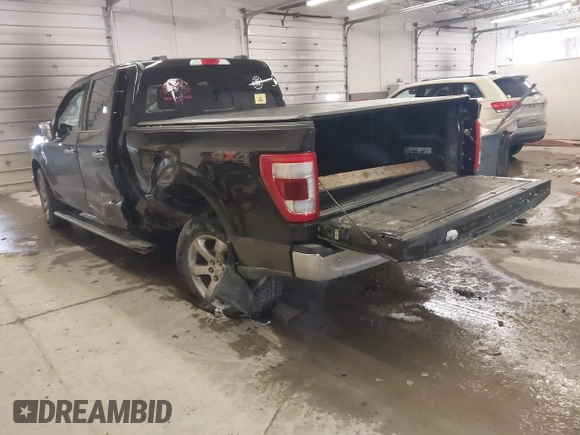 2021 Ford F-150 XL with VIN 1FTFW1E8XMFA47553, listed as a IAAI auction lot 41496255 with 83,711 mi miles. Bid and sale history available at carsss.com. Image 3.