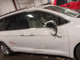 2021 Chrysler Pacifica Touring L with VIN 2C4RC1BG3MR504293, listed as a IAAI auction lot 41728608 with 70,487 mi miles and . Bid and sale history available at DreamBid. Image 13.