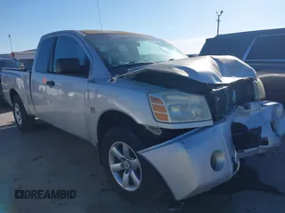 2004 Nissan Titan SE with VIN 1N6AA06A74N553025, listed as a IAAI auction lot 41466773 with 182,110 mi miles. Bid and sale history available at carsss.com. Image 1.