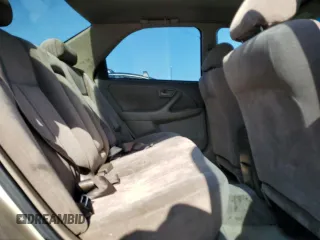 1998 Toyota Camry LE с VIN JT2BG22K3W0120018, выставлен на аукционе Copart как лот 59726215 с пробегом 284 802 миль миль и Чистый • Clean title. История ставок и продаж доступна на DreamBid. Изображение 10.