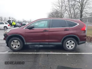 2015 Honda CR-V LX with VIN 2HKRM4H37FH695347, listed as a IAAI auction lot 41124018 with 117,400 mi miles and . Bid and sale history available at carsss.com. Image 15.