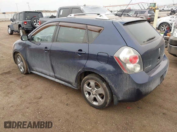 2009 Pontiac Vibe with VIN 5Y2SM67009Z421568, listed as a IAAI auction lot 41712320 with 88,471 mi miles. Bid and sale history available at carsss.com. Image 3.