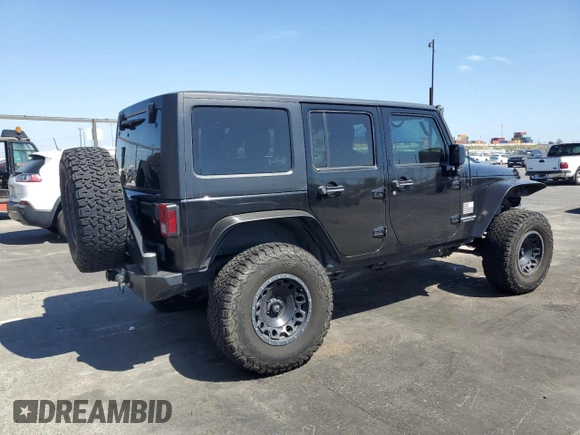 2014 Jeep Wrangler Unlimited Sahara z VIN 1C4BJWEG4EL164226, wystawiony jako Copart lot #53849355 z przebiegiem 82 145 mil mil oraz Szkoda całkowita • Salvage title. Historia ofert i sprzedaży dostępna na DreamBid. Obrazek 3.