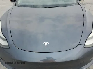 2020 Tesla Model 3 Standard Range Plus z VIN 5YJ3E1EA1LF784832, wystawiony jako Copart lot #57912995 z przebiegiem 77 665 mil mil oraz Szkoda całkowita • Salvage title. Historia ofert i sprzedaży dostępna na DreamBid. Obrazek 11.
