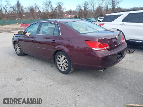 2007 Toyota Avalon XL with VIN 4T1BK36B37U173085, listed as a IAAI auction lot 41748541 with 164,021 mi miles. Bid and sale history available at carsss.com. Image 3.