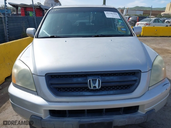 2004 Honda Pilot EX with VIN 2HKYF18514H503083, listed as a IAAI auction lot 41796369 with 172,187 mi miles. Bid and sale history available at carsss.com. Image 6.