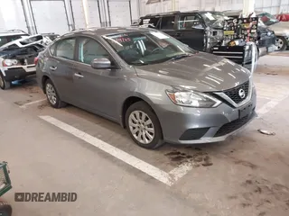 2019 Nissan Sentra S z VIN 3N1AB7AP4KY450295, wystawiony jako IAAI lot #42020007 z przebiegiem 40 408 mil mil oraz . Historia ofert i sprzedaży dostępna na DreamBid. Obrazek 1.