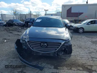 2019 Mazda CX-9 Signature with VIN JM3TCBEYXK0324257, listed as a IAAI auction lot 41986590 with Not provided miles and . Bid and sale history available at DreamBid. Image 12.