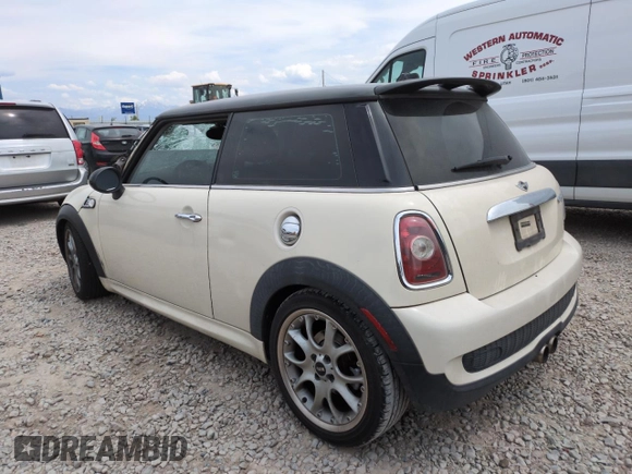 2009 MINI Hardtop S with VIN WMWMF73569TW87347, listed as a Copart auction lot 59445035 with Not provided miles and Salvage title. Bid and sale history available at DreamBid. Image 2.