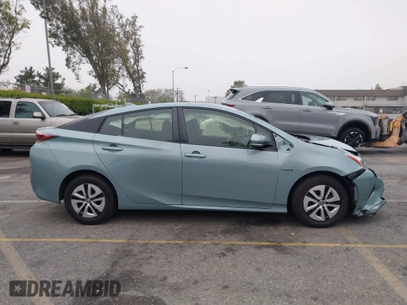2017 Toyota Prius Two with VIN JTDKARFU7H3052594, listed as a IAAI auction lot 42035969 with 50,789 mi miles and . Bid and sale history available at DreamBid. Image 13.